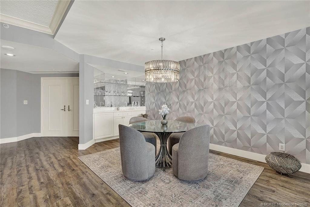 8600 South Ocean Drive, Unit LN3 Jensen Beach, FL 34957 - Photo 11 of 63 a dining room with table and chairs