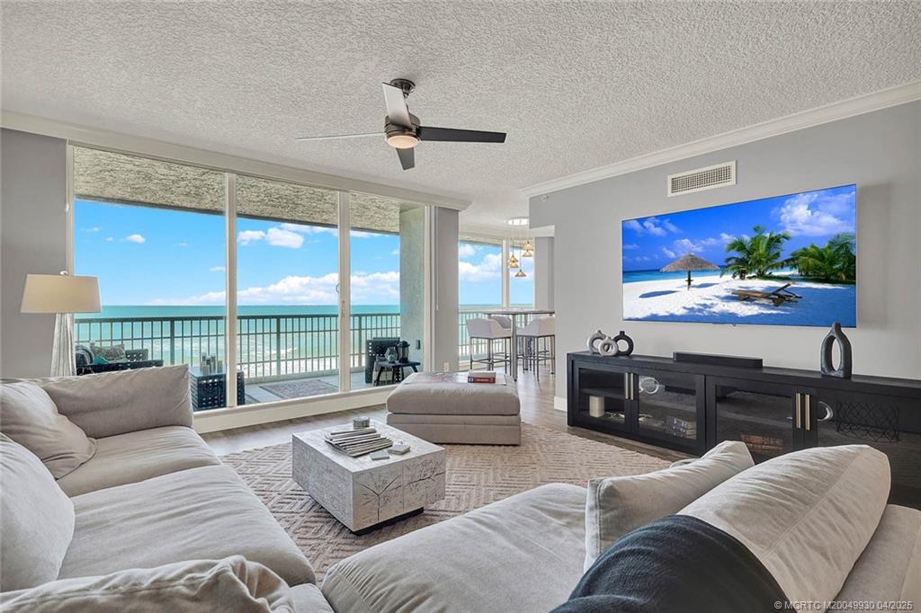 8600 South Ocean Drive, Unit LN3 Jensen Beach, FL 34957 - Photo 13 of 63 a living room with furniture and a flat screen tv