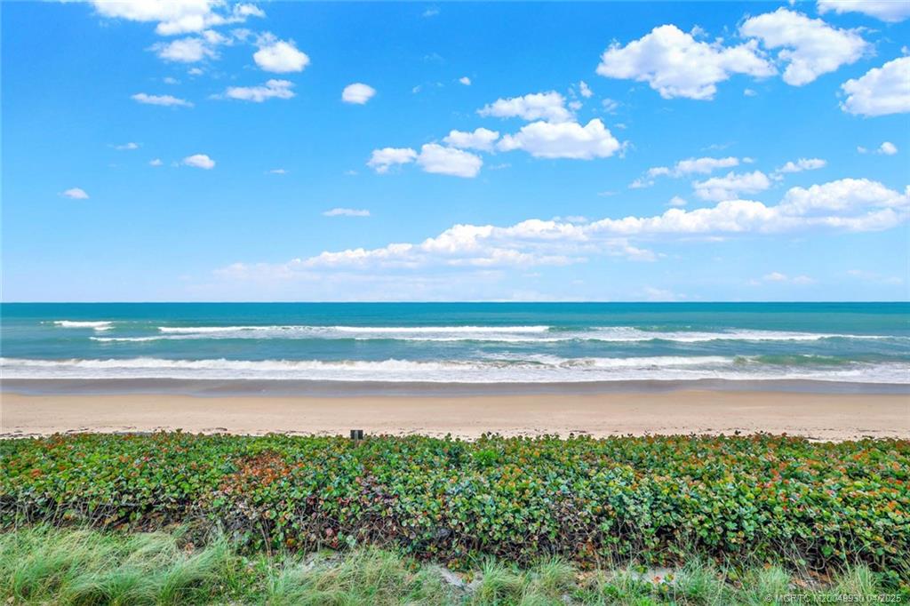 8600 South Ocean Drive, Unit LN3 Jensen Beach, FL 34957 - Photo 3 of 63 a view of an ocean and a building