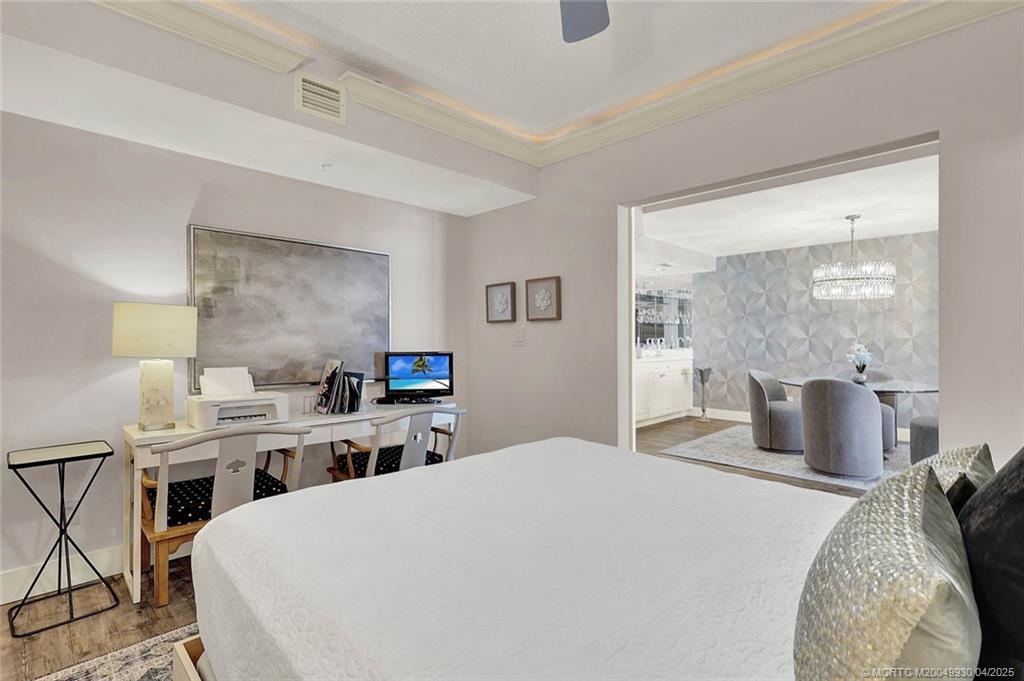 8600 South Ocean Drive, Unit LN3 Jensen Beach, FL 34957 - Photo 38 of 63 a bed room with a bed and a view of kitchen