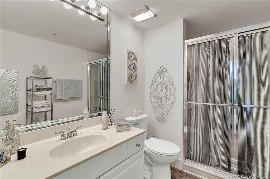 8600 South Ocean Drive, Unit LN3 Jensen Beach, FL 34957 - Photo 39 of 63 a bathroom with a toilet a sink and a shower