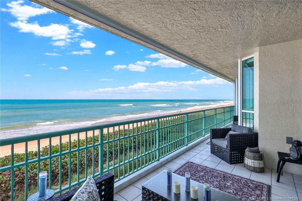 8600 South Ocean Drive, Unit LN3 Jensen Beach, FL 34957 - Photo 5 of 63 a view of a two chairs in the balcony