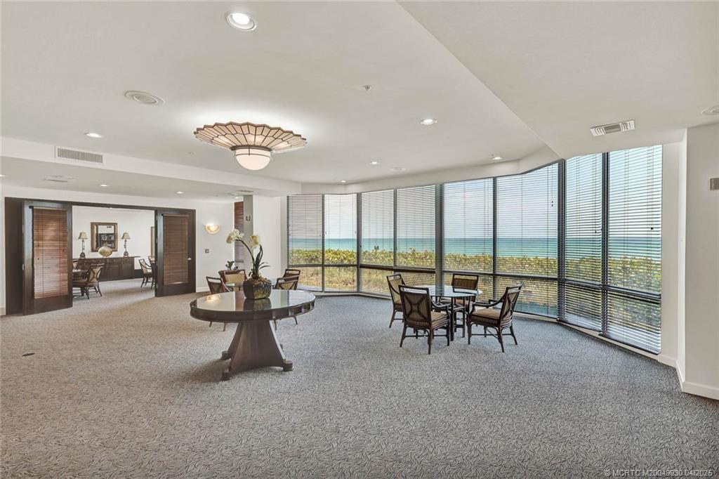 8600 South Ocean Drive, Unit LN3 Jensen Beach, FL 34957 - Photo 57 of 63 a living room with furniture and large windows