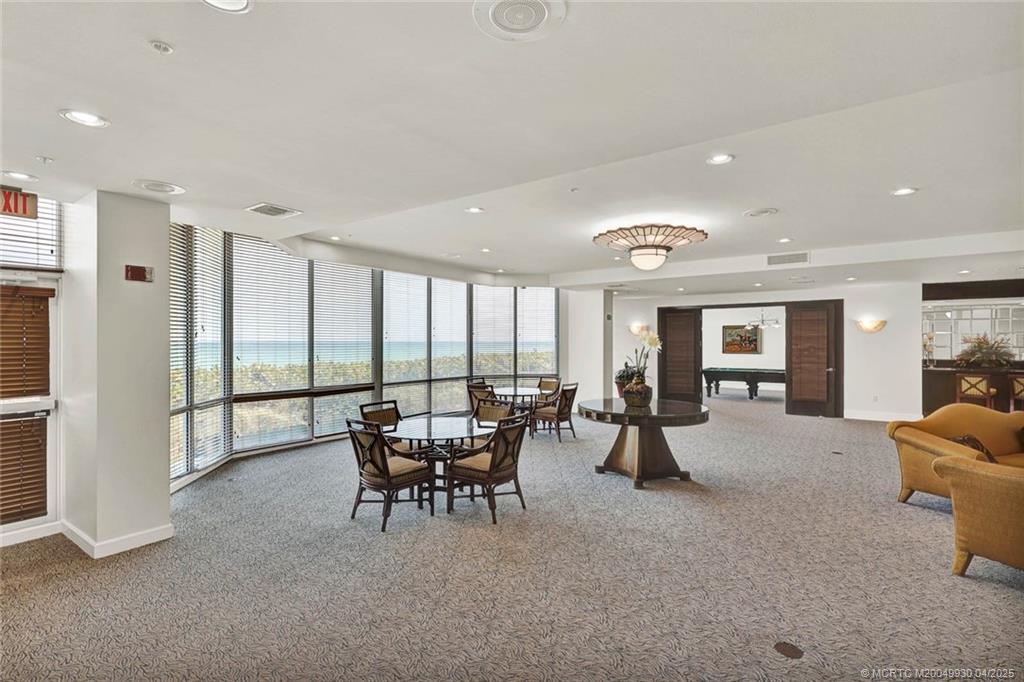 8600 South Ocean Drive, Unit LN3 Jensen Beach, FL 34957 - Photo 58 of 63 a living room with furniture and large windows