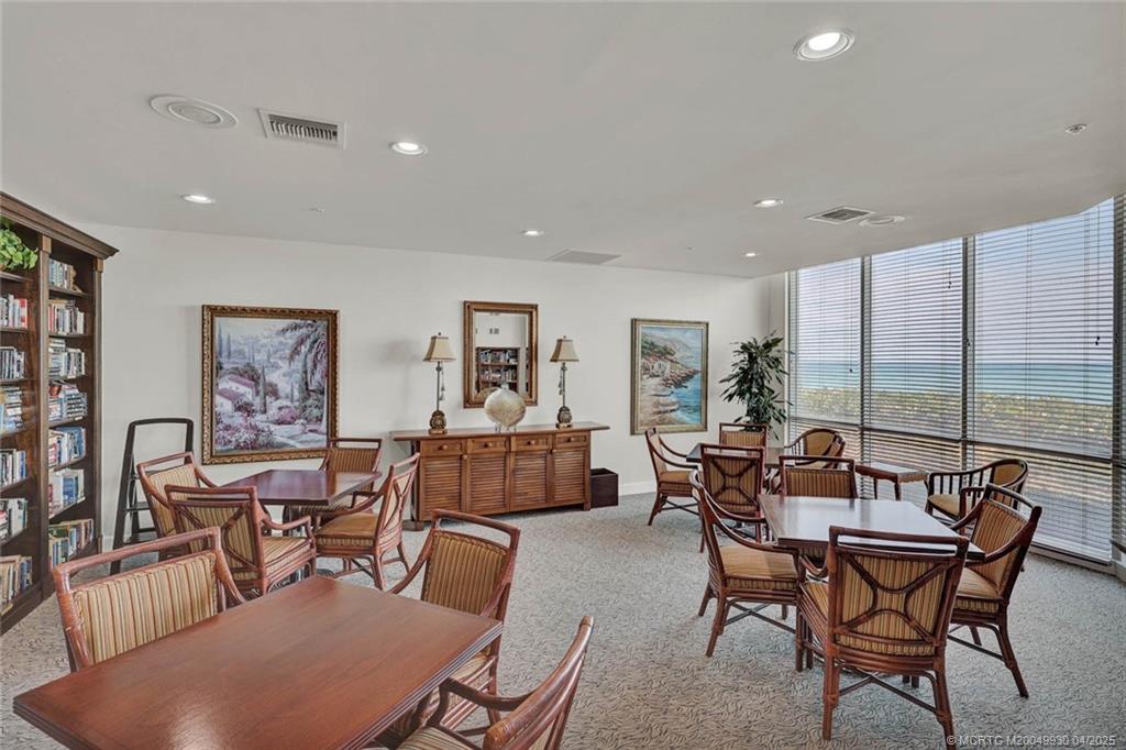 8600 South Ocean Drive, Unit LN3 Jensen Beach, FL 34957 - Photo 59 of 63 a dining room with furniture and wooden floor