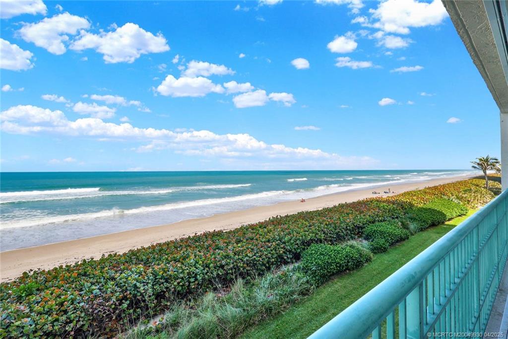 8600 South Ocean Drive, Unit LN3 Jensen Beach, FL 34957 - Photo 7 of 63 a view of an ocean and a yard