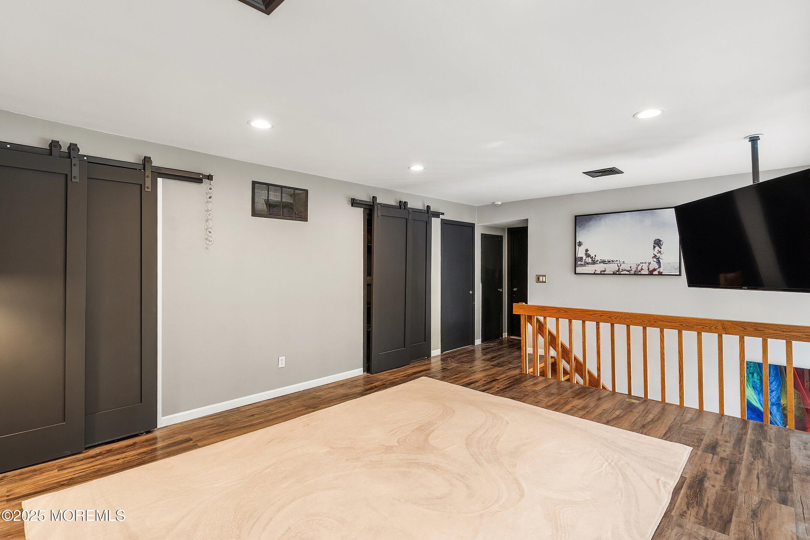 409 Aldrich Road Howell, NJ 07731 - Photo 19 of 27 a bedroom with a bed and a dresser