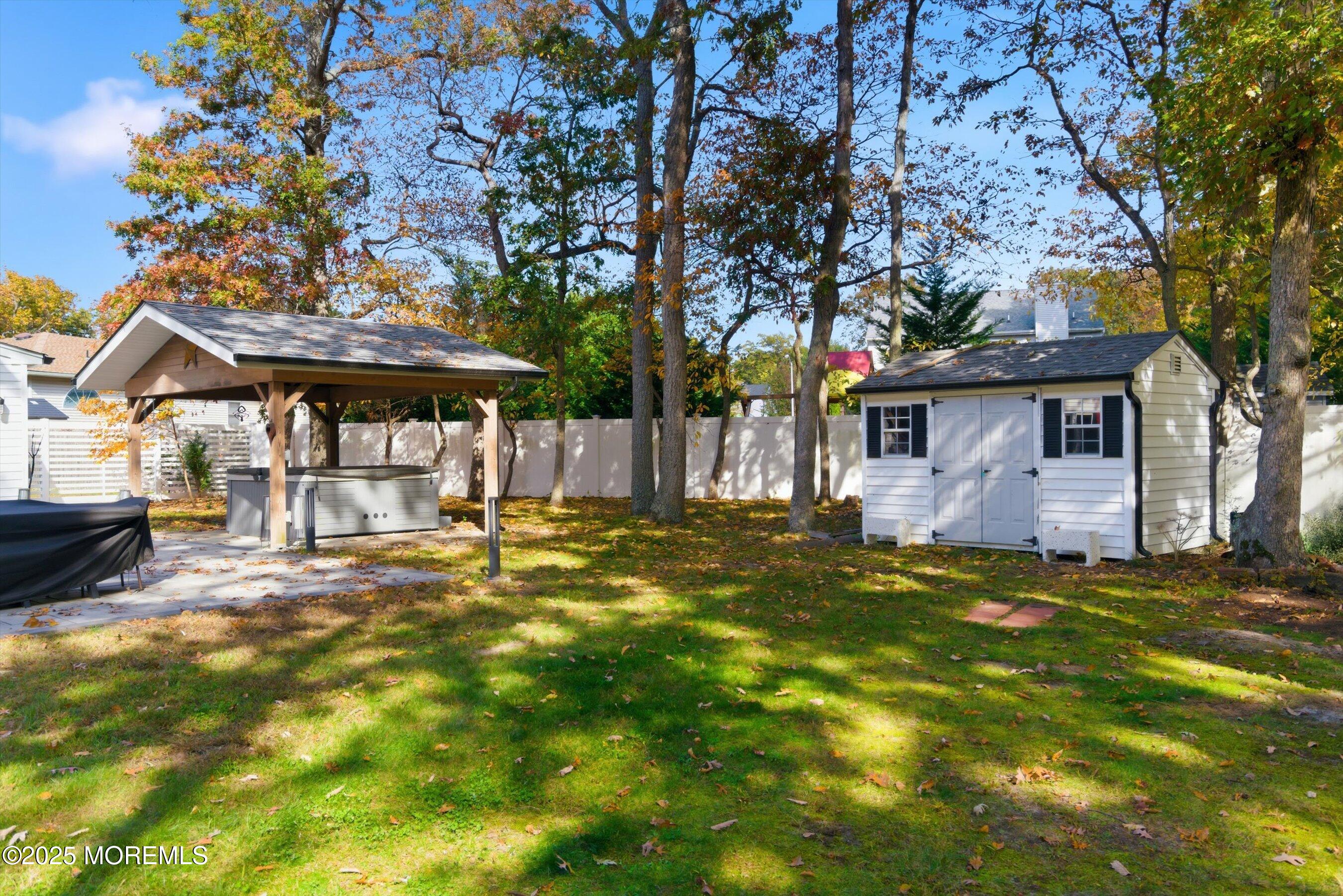 409 Aldrich Road Howell, NJ 07731 - Photo 25 of 27 a view of a house with pool and sitting area