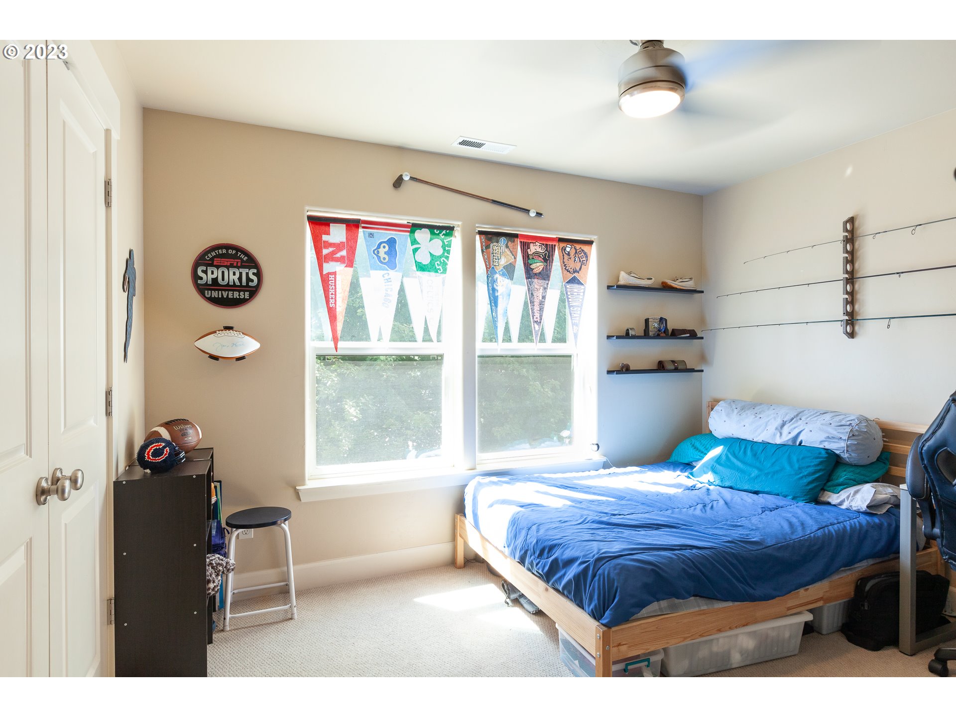 1615 4th Street Hood River, OR 97031 - Photo 24 of 33 a bedroom with a bed and a window