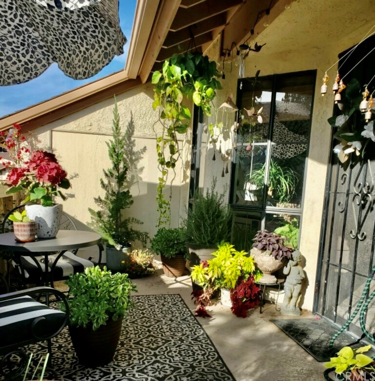 3110 Cochise Way, Unit 103 Fullerton, CA 92833 - Photo 12 of 14 a flower pot with flowers and flowers