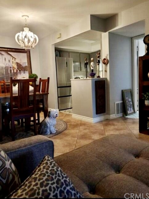3110 Cochise Way, Unit 103 Fullerton, CA 92833 - Photo 3 of 14 a living room with furniture