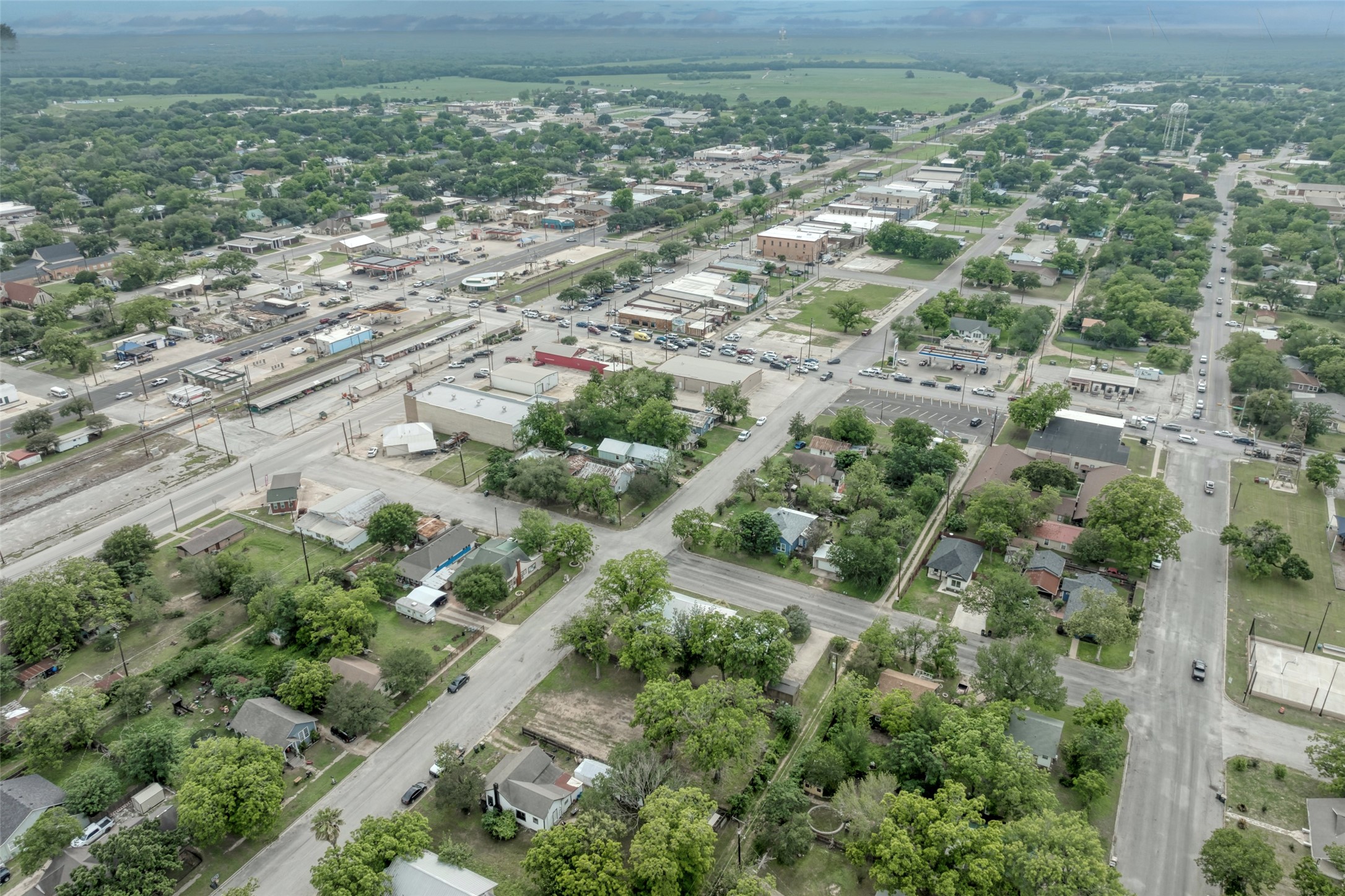 809 East Fannin Street Luling, TX 78648 - Photo 16 of 16 an aerial view of residential houses with outdoor space