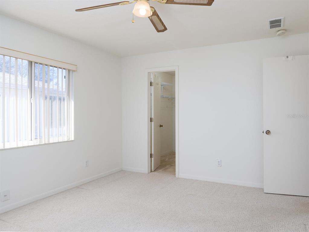 6086 Southwest 98th Loop Ocala, FL 34476 - Photo 17 of 49 a view of an empty room with a window