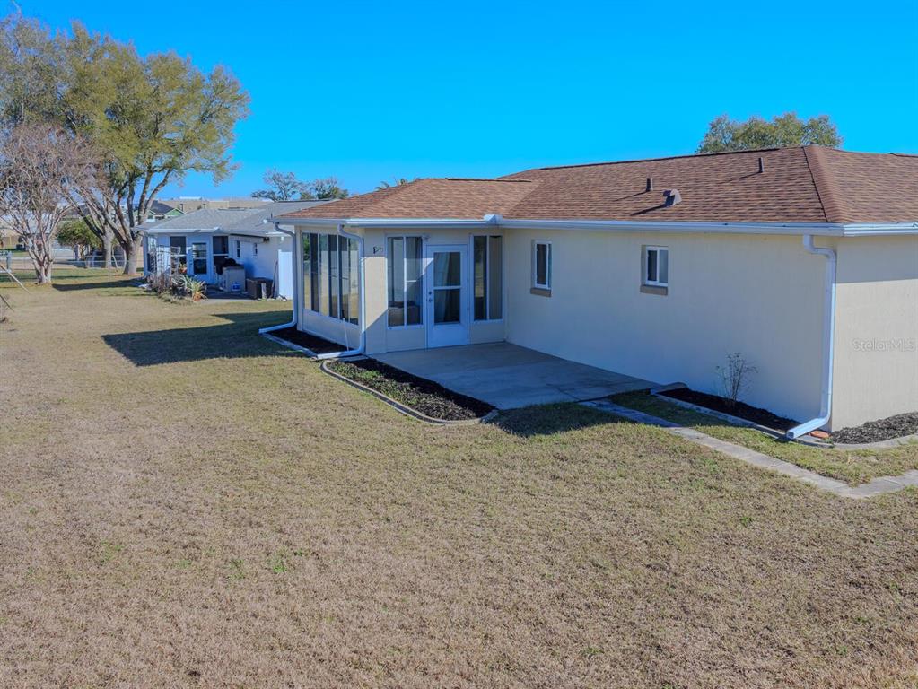 6086 Southwest 98th Loop Ocala, FL 34476 - Photo 31 of 49 front view of house with a yard