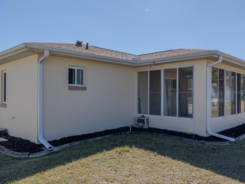 6086 Southwest 98th Loop Ocala, FL 34476 - Photo 35 of 49 a view of a house with backyard