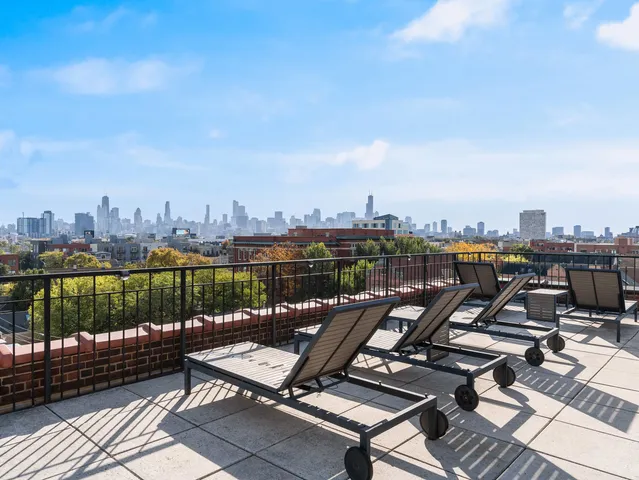 a view of a terrace with furniture