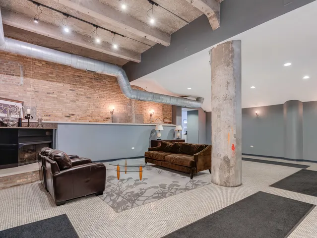 a picture of a bench in front of a wall