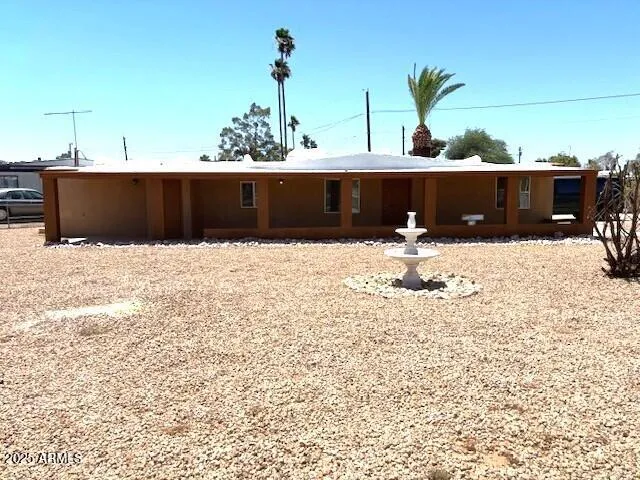 a view of roof with wooden fence