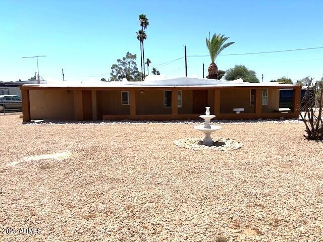 a view of roof with wooden fence