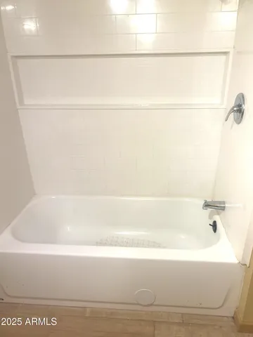 a bathroom with a bathtub