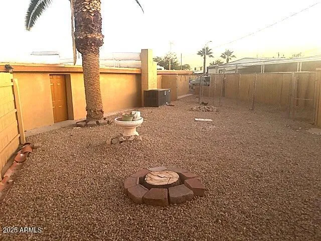 a view of a backyard of the house