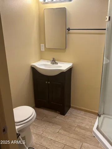 a bathroom with a sink and a toilet