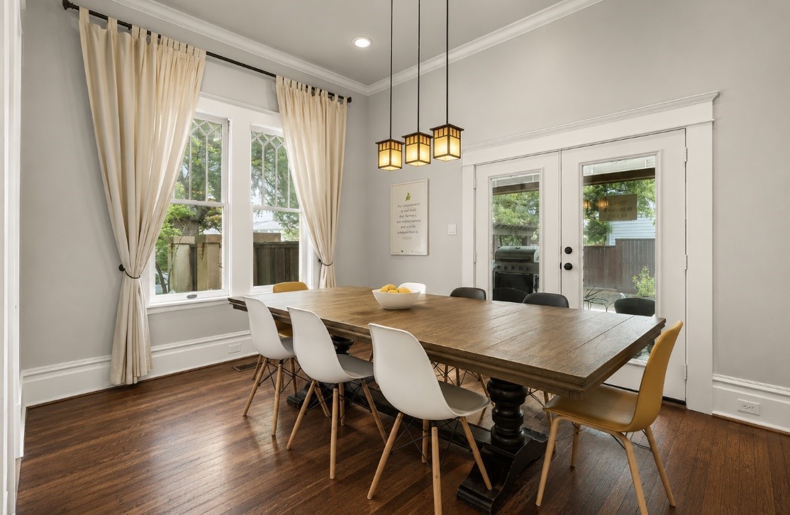 945 Harvard Street Houston, TX 77008 - Photo 14 of 47 a view of a dining room with furniture window and wooden floor