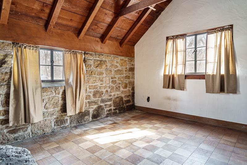 3134 North River Road Oregon, IL 61061 - Photo 18 of 59 a view of an empty room with a window