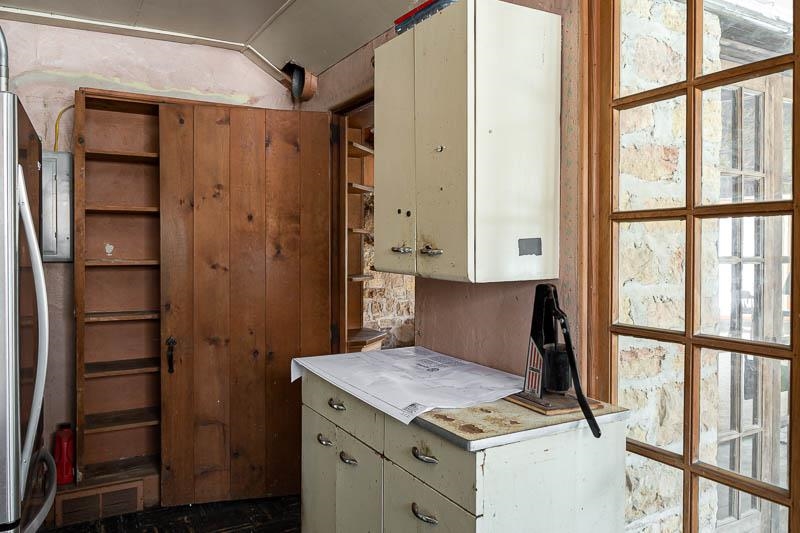 3134 North River Road Oregon, IL 61061 - Photo 30 of 59 a kitchen that has a refrigerator and a window in it