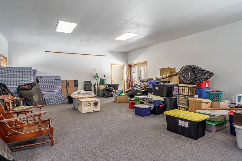 3134 North River Road Oregon, IL 61061 - Photo 35 of 59 a living room with furniture and a gym machine