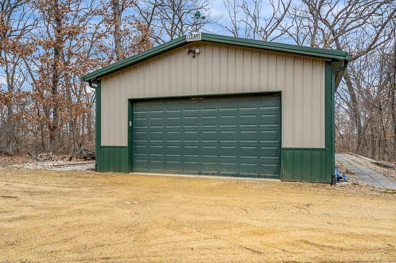 3134 North River Road Oregon, IL 61061 - Photo 6 of 59 a front view of a house with a yard