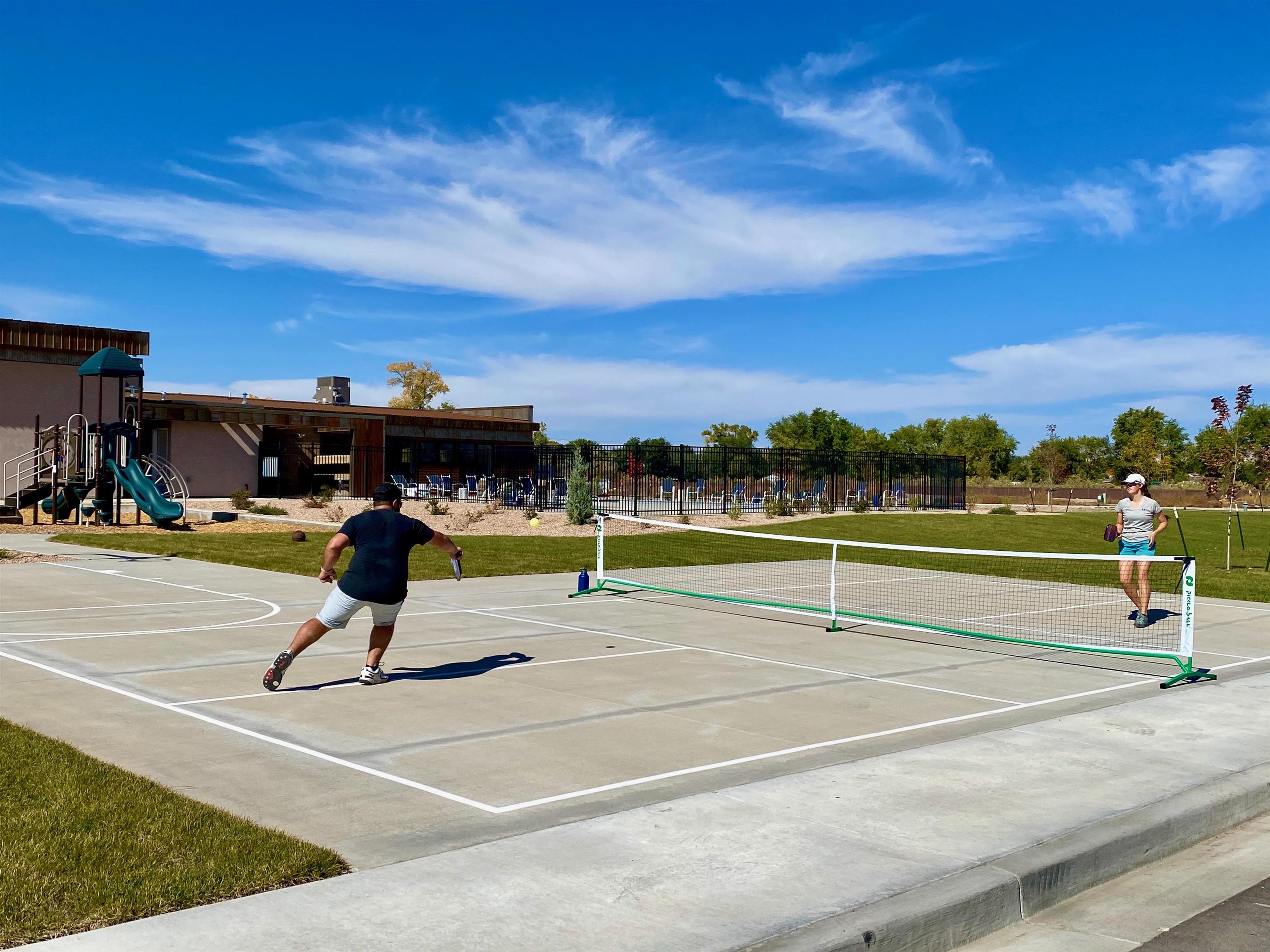 450 Red River Loop Clifton, CO 81520 - Photo 16 of 18 a view of a tennis court