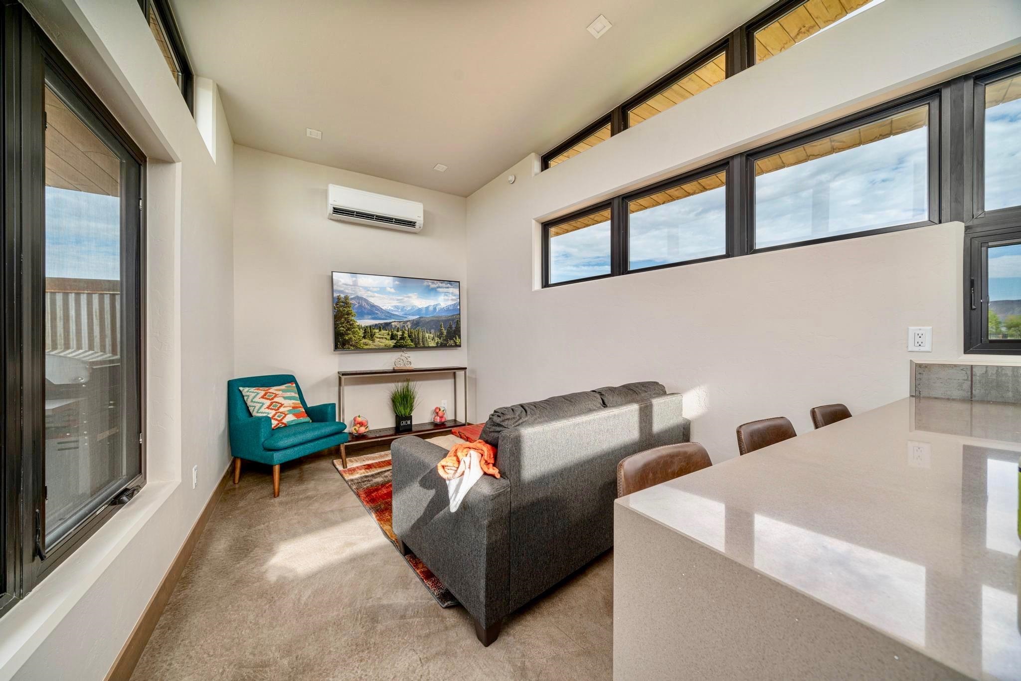 450 Red River Loop Clifton, CO 81520 - Photo 3 of 18 a living room with furniture and a window