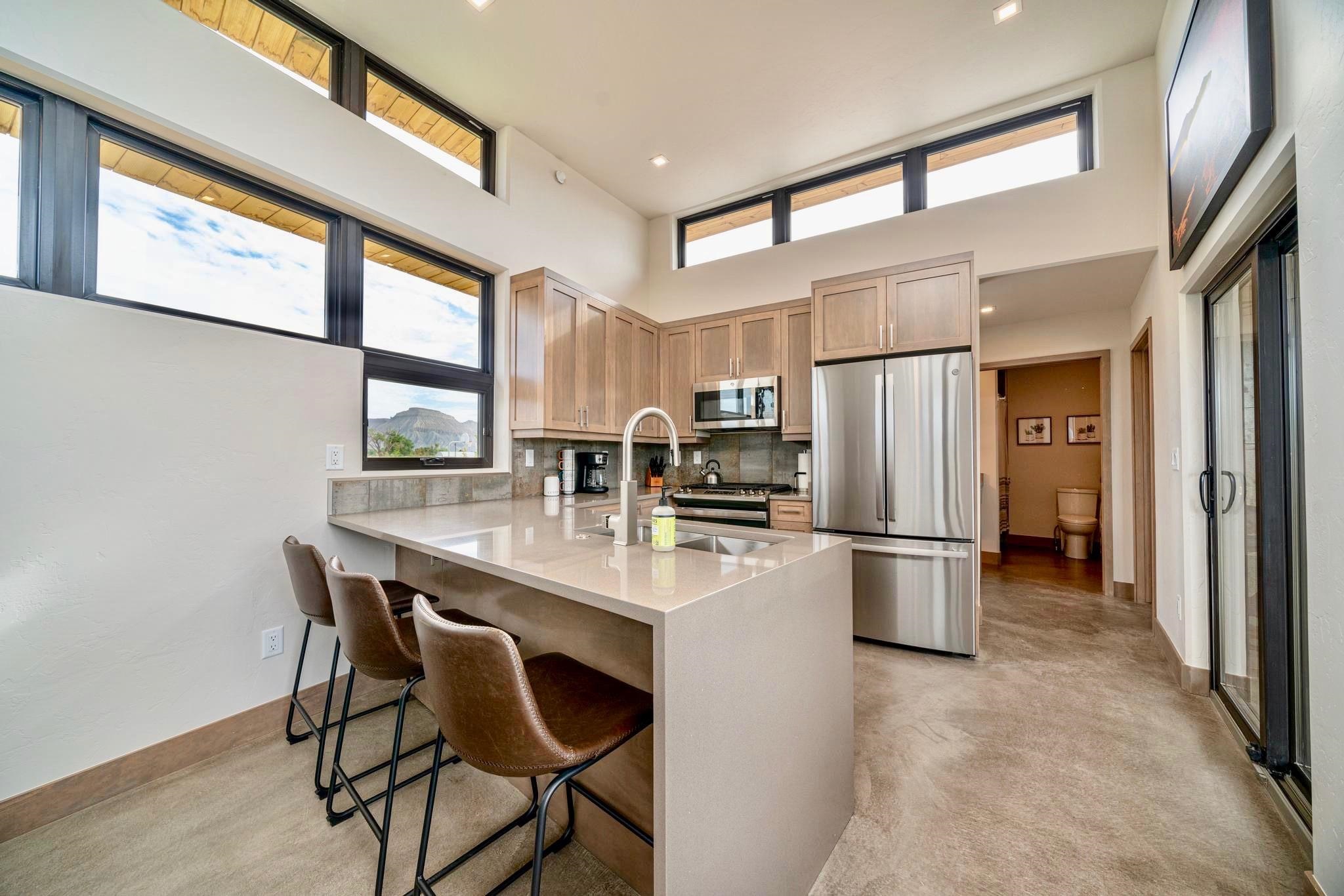 450 Red River Loop Clifton, CO 81520 - Photo 4 of 18 a kitchen with refrigerator and cabinets