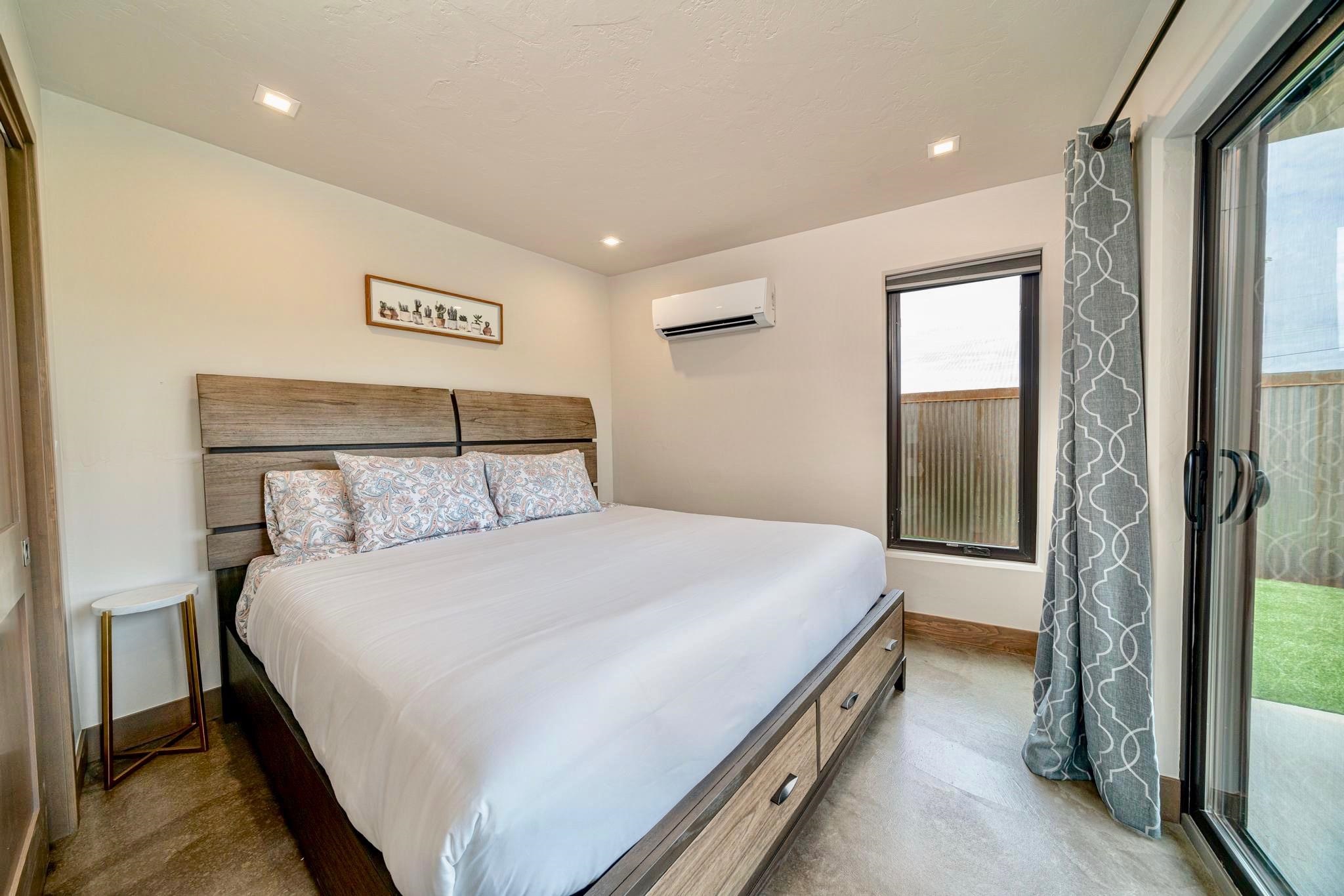 450 Red River Loop Clifton, CO 81520 - Photo 7 of 18 a bedroom with a bed and a large mirror