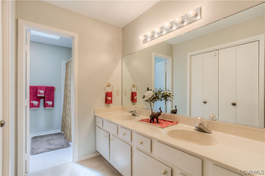 13502 Lady Ashley Road Midlothian, VA 23114 - Photo 17 of 34 Master bathroom with double vanity sinks and priva