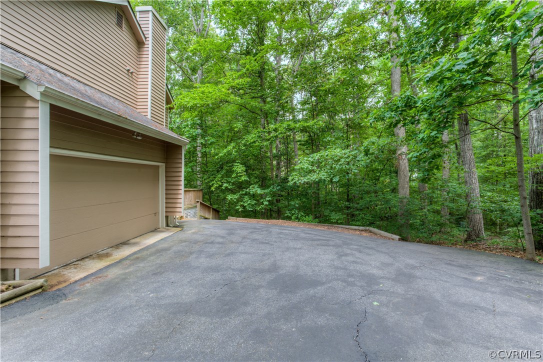13502 Lady Ashley Road Midlothian, VA 23114 - Photo 31 of 34 Double wide parking and 2 car garage with auto doo