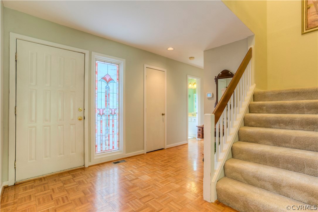 Front entry includes a stained glass side light wi