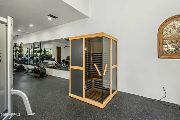 a view of a room with gym equipment