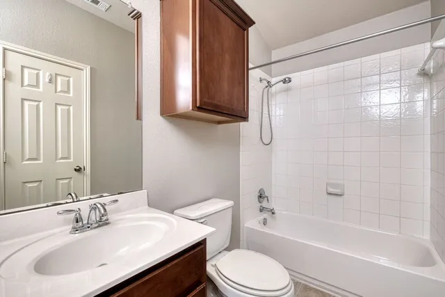 a view of storage and utility room with washer and dryer