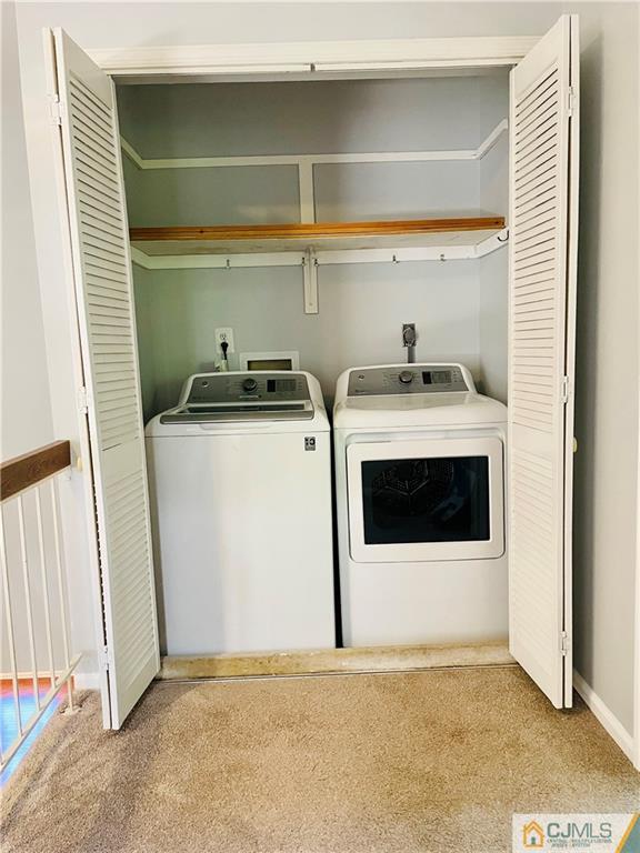 701 Timber Oaks Road Edison, NJ 08820 - Photo 19 of 23 a utility room with dryer and washer