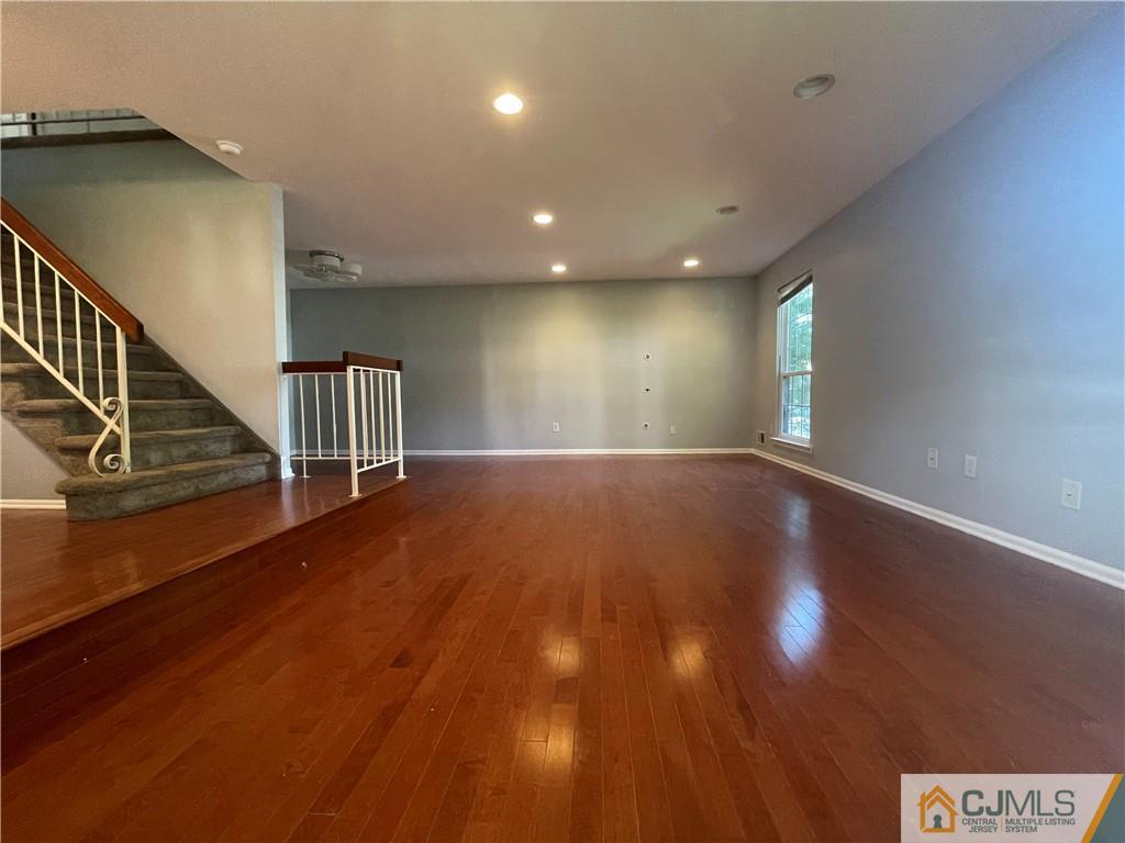 701 Timber Oaks Road Edison, NJ 08820 - Photo 4 of 23 a view of an empty room with stairs and ventilation