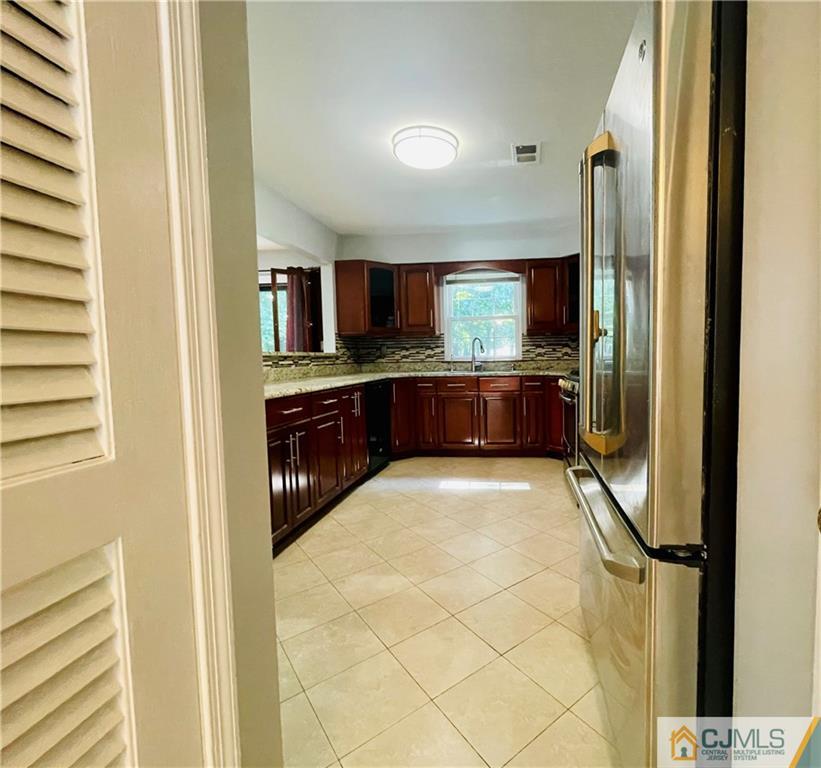 701 Timber Oaks Road Edison, NJ 08820 - Photo 7 of 23 a large bathroom with a large tub and sink
