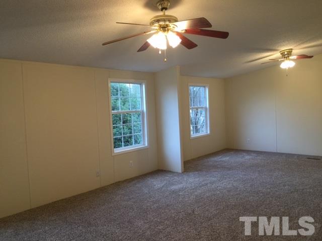 10835 Smith Road Middlesex, NC 27557 - Photo 8 of 13 a view of empty room with window