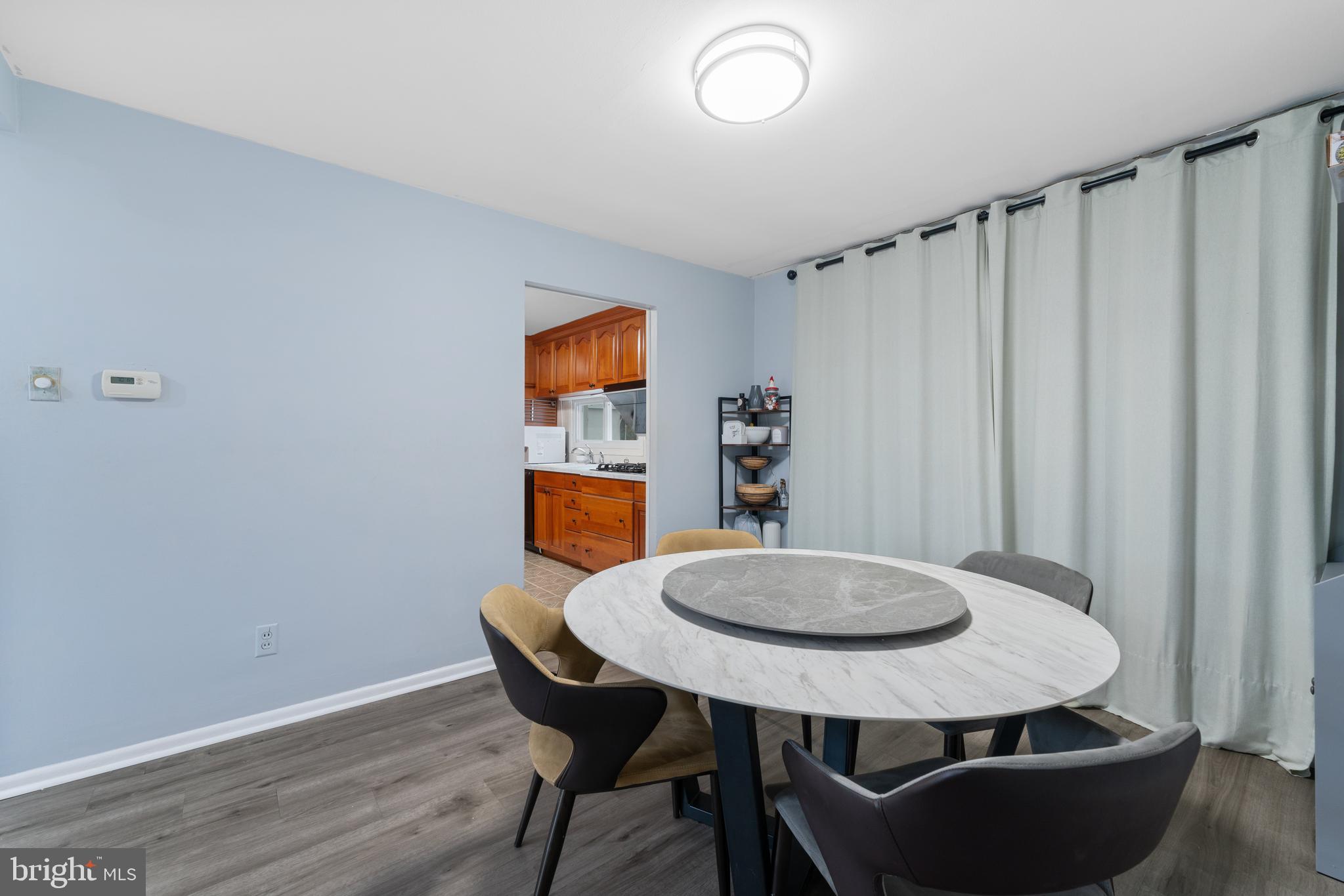 416 Emerson Road Huntingdon Valley, PA 19006 - Photo 15 of 36 a dining room with a table and chairs