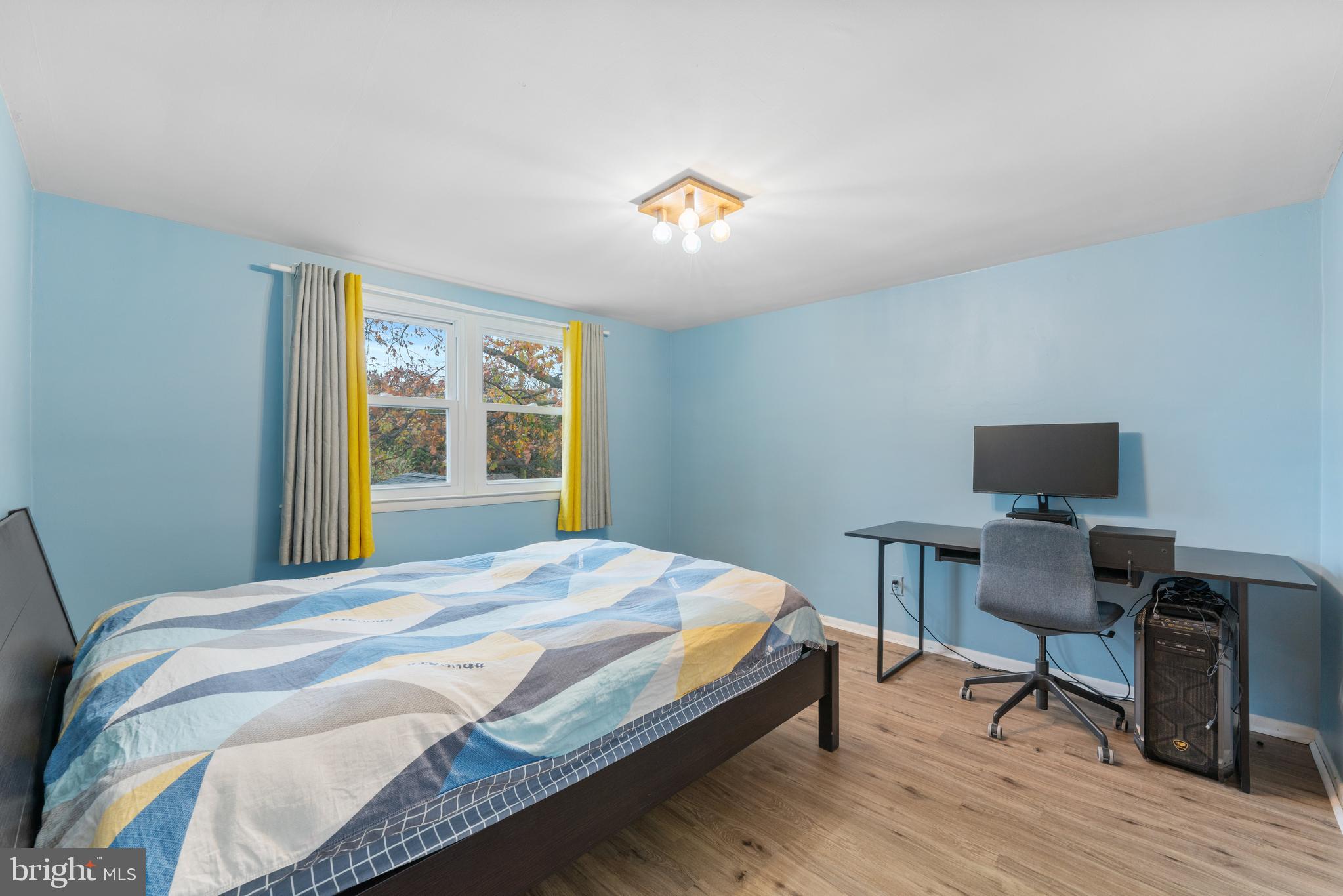 416 Emerson Road Huntingdon Valley, PA 19006 - Photo 17 of 36 a bedroom with a bed and a desk