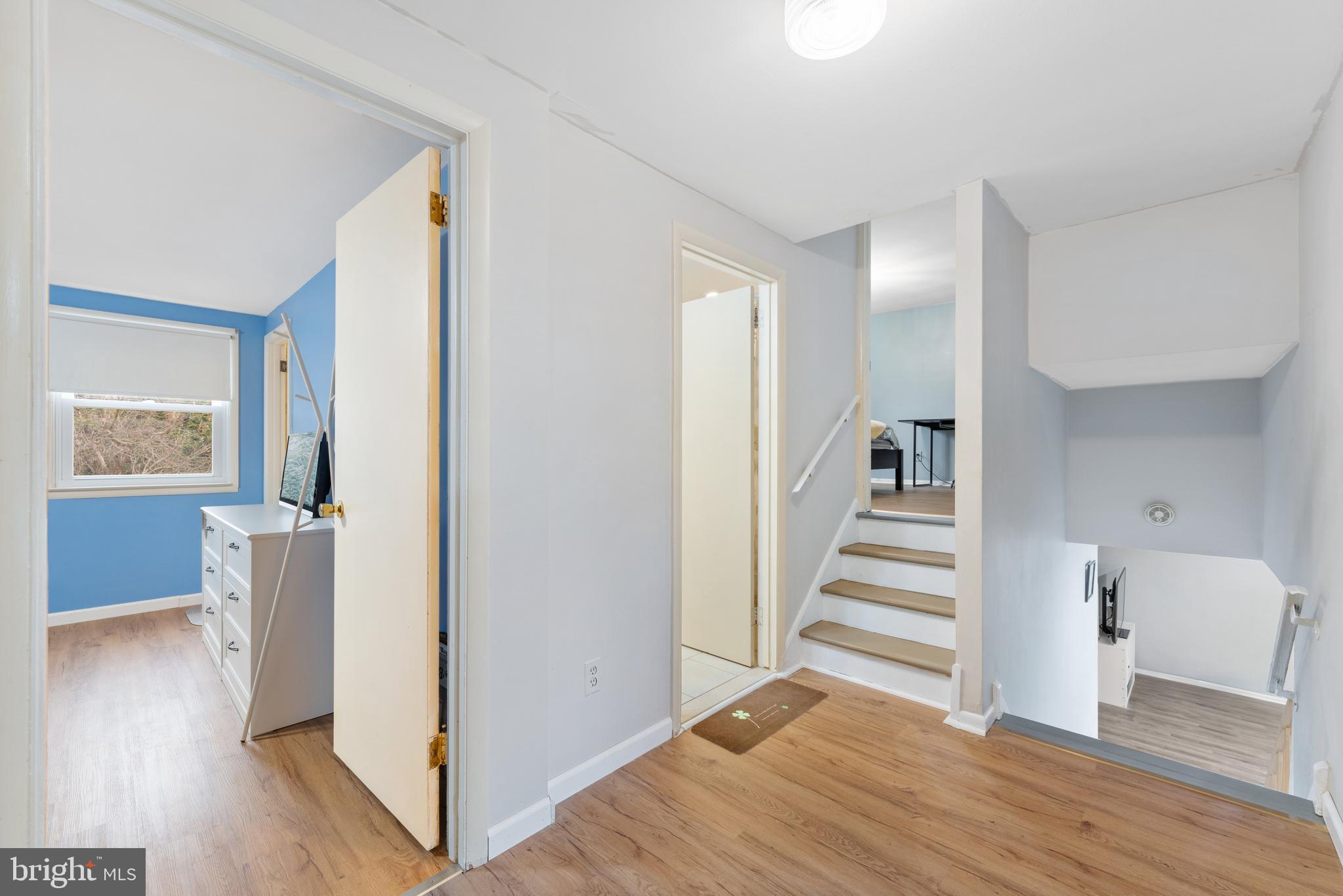 416 Emerson Road Huntingdon Valley, PA 19006 - Photo 25 of 36 a view of a hallway with wooden floor and entryway