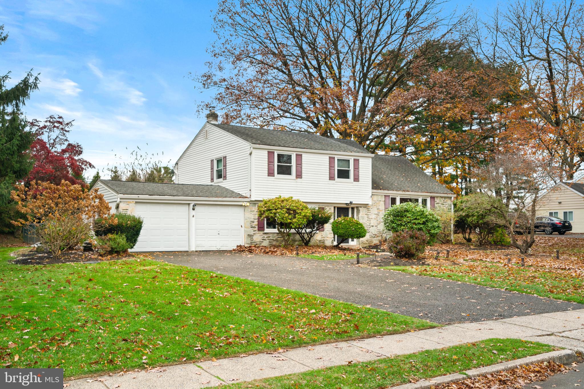 416 Emerson Road Huntingdon Valley, PA 19006 - Photo 3 of 36 a front view of a house with a yard and a porch