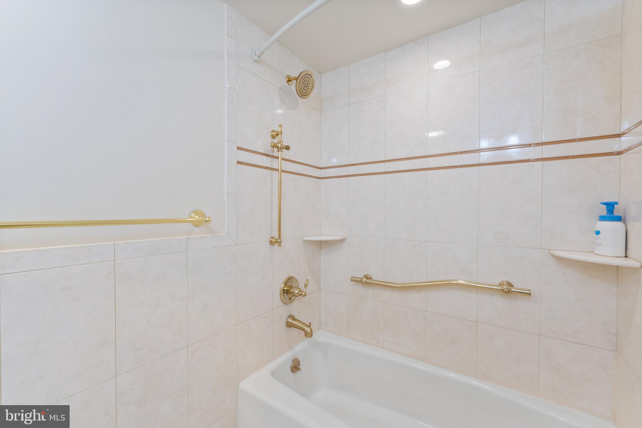 416 Emerson Road Huntingdon Valley, PA 19006 - Photo 32 of 36 a bathroom with a bathtub and a shower