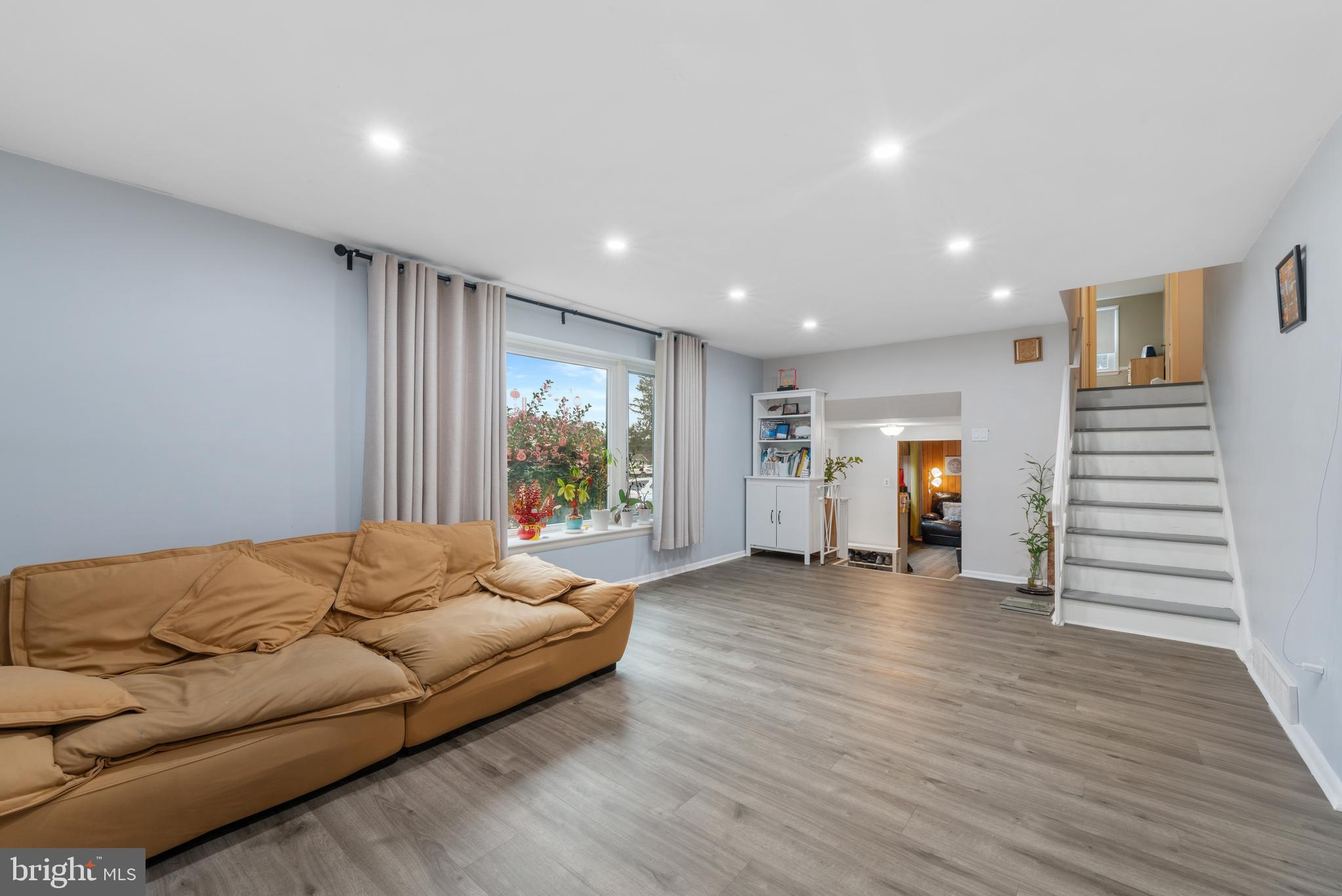 416 Emerson Road Huntingdon Valley, PA 19006 - Photo 5 of 36 a living room with furniture and a large window